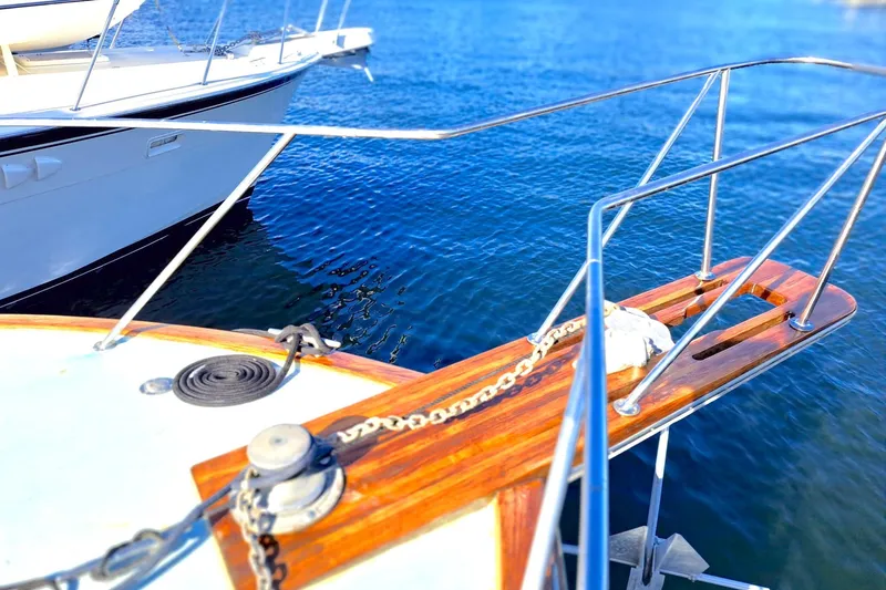 Nobody Yacht Photos Pics Bow of 1988 Ocean Yachts 48 Super Sport on calm blue water.