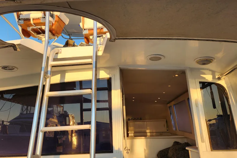 Nobody Yacht Photos Pics 1988 Ocean Yachts 48 Super Sport interior with ladder and life preservers.