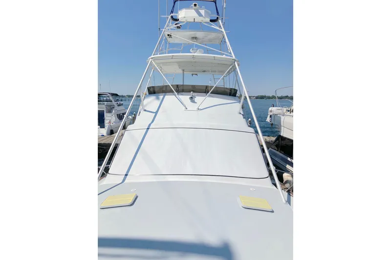 Nobody Yacht Photos Pics 1988 Ocean Yachts 48 Super Sport docked, showcasing sleek design and spacious deck.