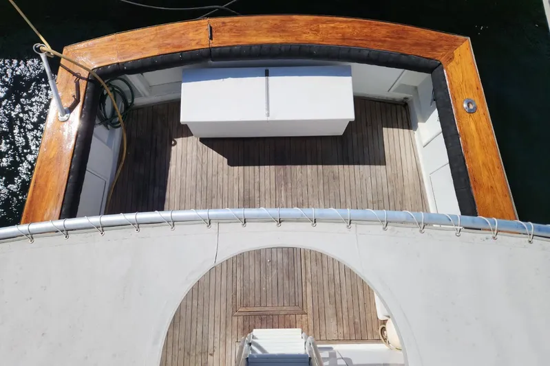 Nobody Yacht Photos Pics Top view of 1988 Ocean Yachts 48 Super Sport deck with wooden finish.