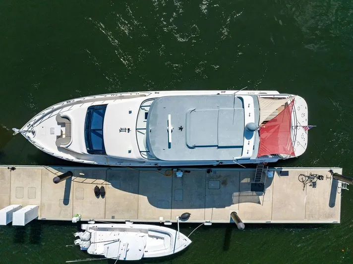  Yacht Photos Pics Aerial view of 2013 Hatteras 80 Motor Yacht docked at marina.