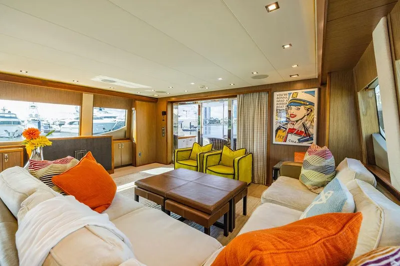  Yacht Photos Pics Luxurious interior of 2013 Hatteras 80 Motor Yacht with vibrant decor and modern furnishings.
