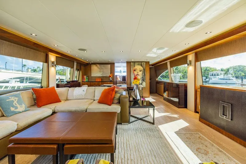  Yacht Photos Pics Luxurious interior of 2013 Hatteras 80 Motor Yacht with elegant furnishings and large windows.