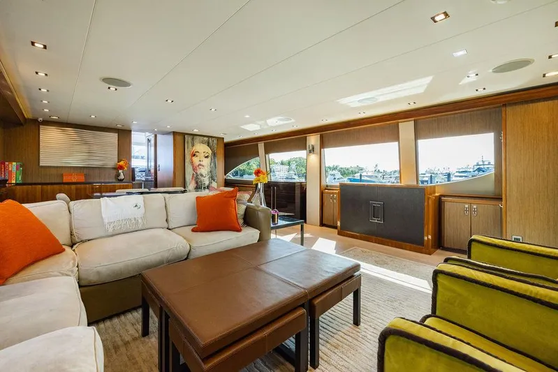  Yacht Photos Pics Luxurious interior of 2013 Hatteras 80 Motor Yacht with modern furnishings and large windows.