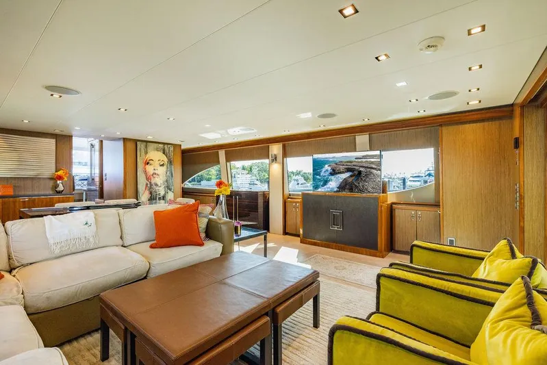  Yacht Photos Pics Luxurious interior of 2013 Hatteras 80 Motor Yacht with elegant seating and decor.