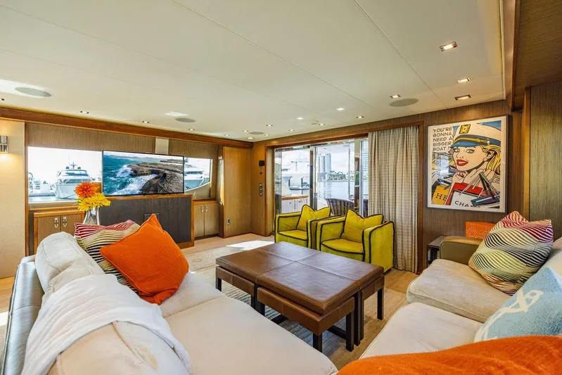  Yacht Photos Pics Luxurious interior of 2013 Hatteras 80 Motor Yacht with modern decor and vibrant accents.