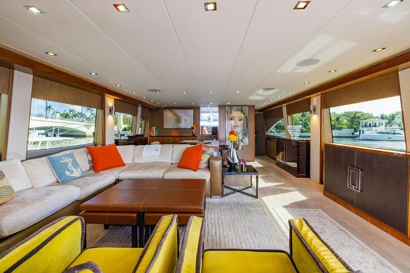  Yacht Photos Pics Luxurious interior of 2013 Hatteras 80 Motor Yacht with modern decor and ample seating.