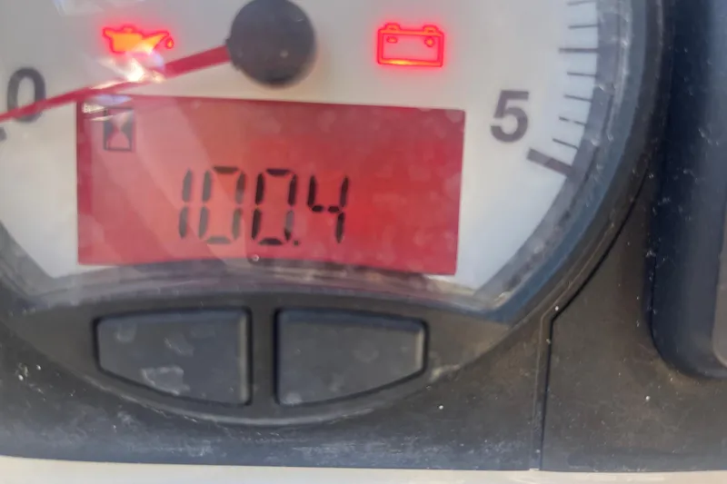 La Bella Vita Yacht Photos Pics Close-up of Beneteau Oceanis 45 gauge showing 100.4 hours with warning lights.