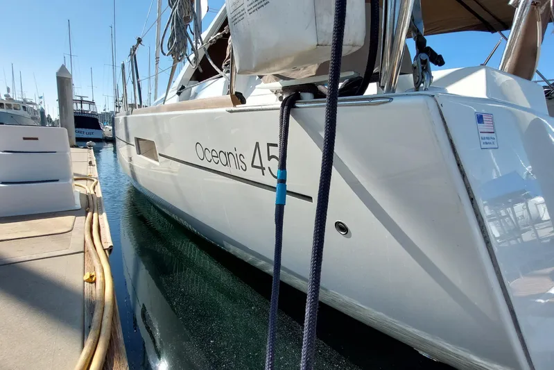 La Bella Vita Yacht Photos Pics 2015 Beneteau Oceanis 45 yacht docked at marina, side view.