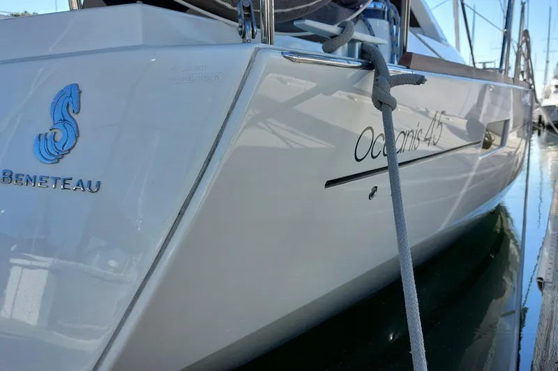 La Bella Vita Yacht Photos Pics 2015 Beneteau Oceanis 45 yacht docked, showcasing sleek design and branding.