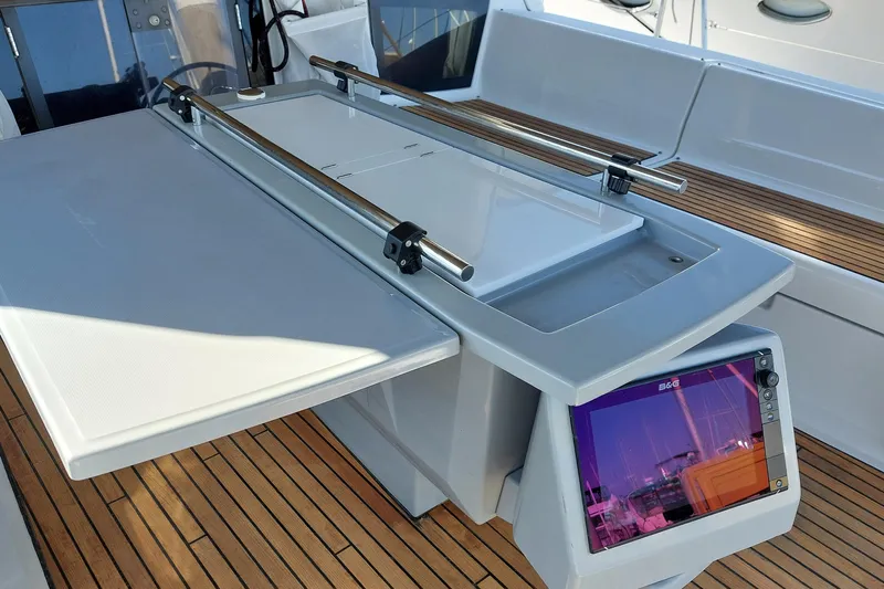 La Bella Vita Yacht Photos Pics Beneteau Oceanis 45 cockpit with navigation equipment and teak flooring, 2015 model.