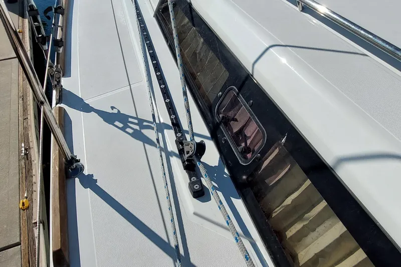 La Bella Vita Yacht Photos Pics Deck view of a 2015 Beneteau Oceanis 45 sailboat, showcasing rigging and window details.