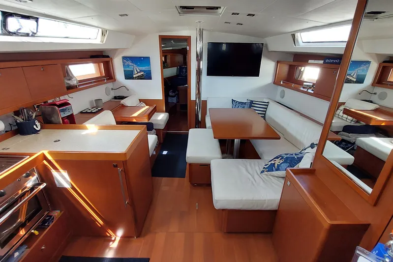 La Bella Vita Yacht Photos Pics Interior of 2015 Beneteau Oceanis 45 yacht with modern kitchen and seating area.