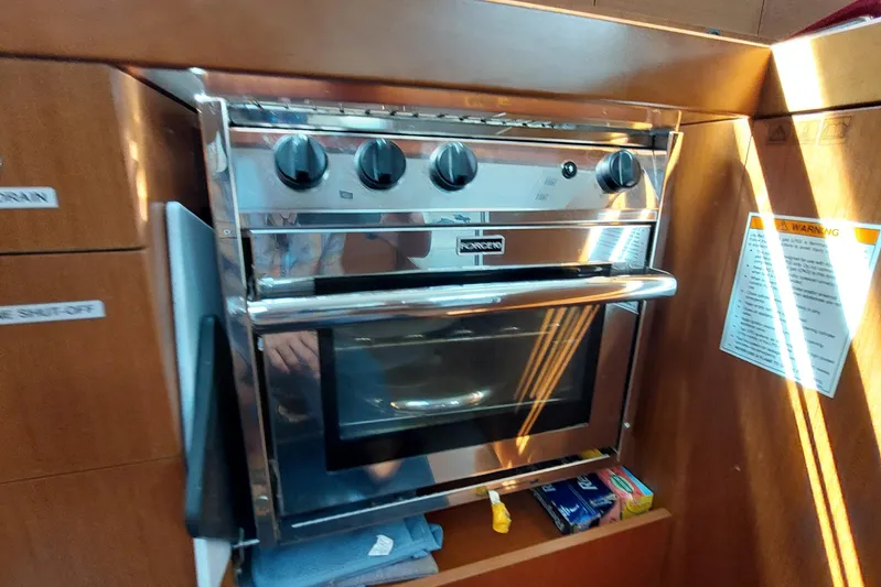 La Bella Vita Yacht Photos Pics Stainless steel oven in 2015 Beneteau Oceanis 45 yacht kitchen interior.