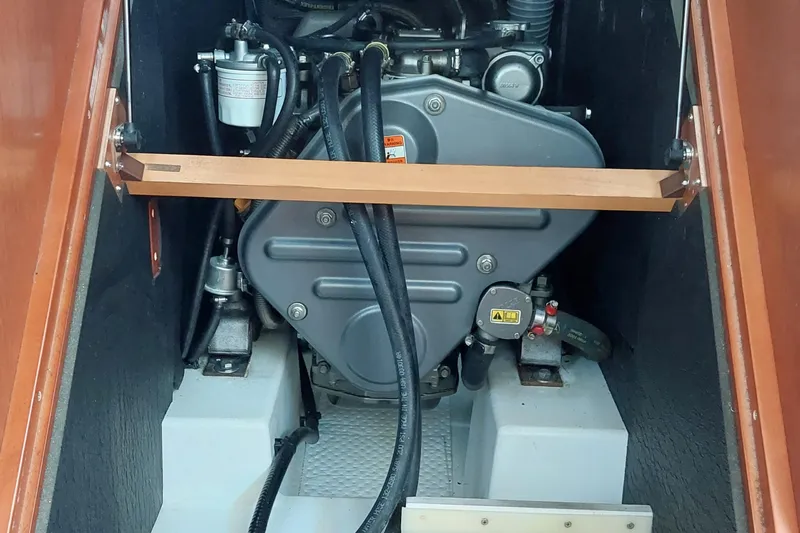 La Bella Vita Yacht Photos Pics Engine compartment of a 2015 Beneteau Oceanis 45 sailboat, showcasing mechanical components.