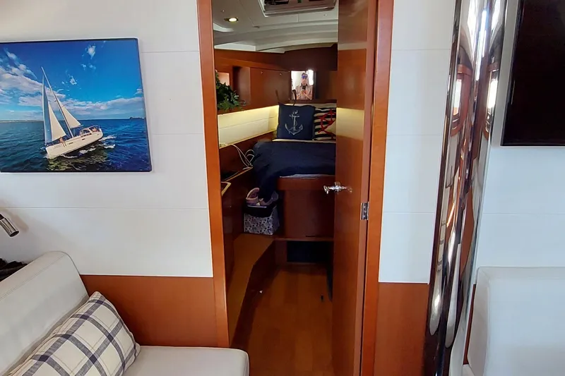 La Bella Vita Yacht Photos Pics Interior of 2015 Beneteau Oceanis 45 yacht with cozy cabin and nautical decor.