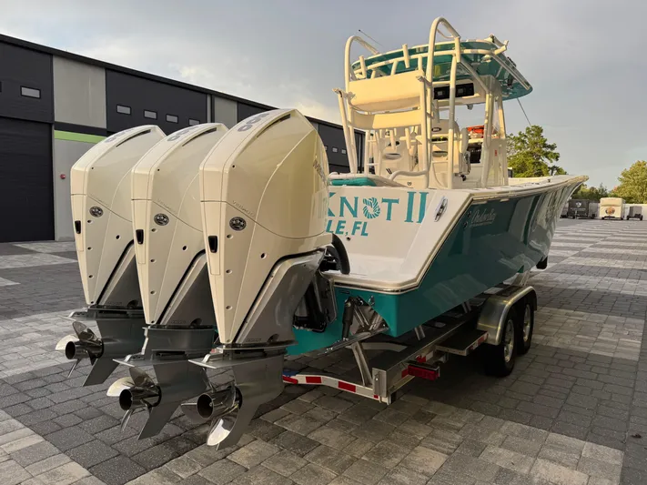  Yacht Photos Pics 2020 Onslow Bay 33 Tournament boat with triple engines on a trailer.