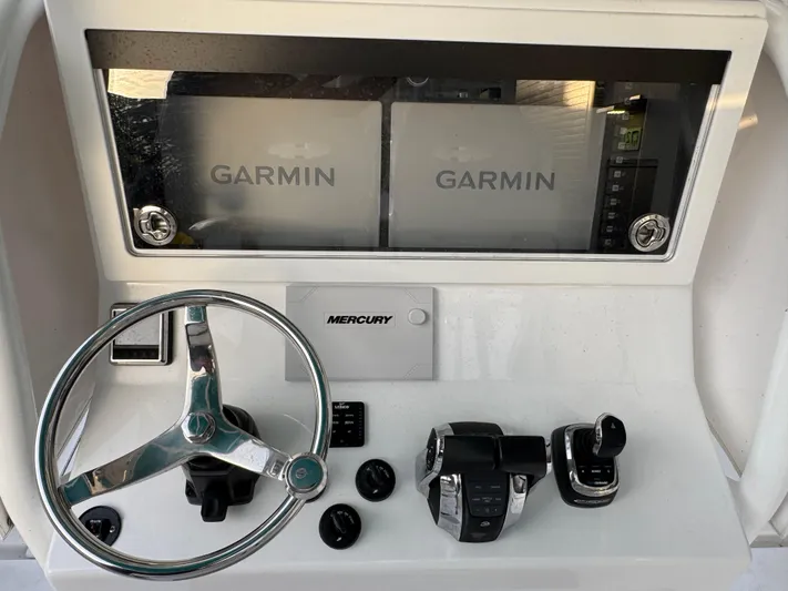  Yacht Photos Pics 2020 Onslow Bay 33 Tournament boat dashboard with Garmin displays and Mercury controls.