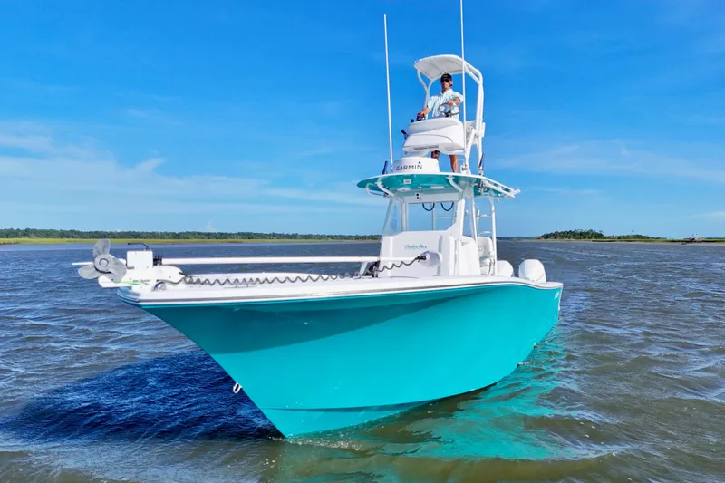  Yacht Photos Pics 2021 Onslow Bay 33 Tournament boat on water, clear blue sky background.