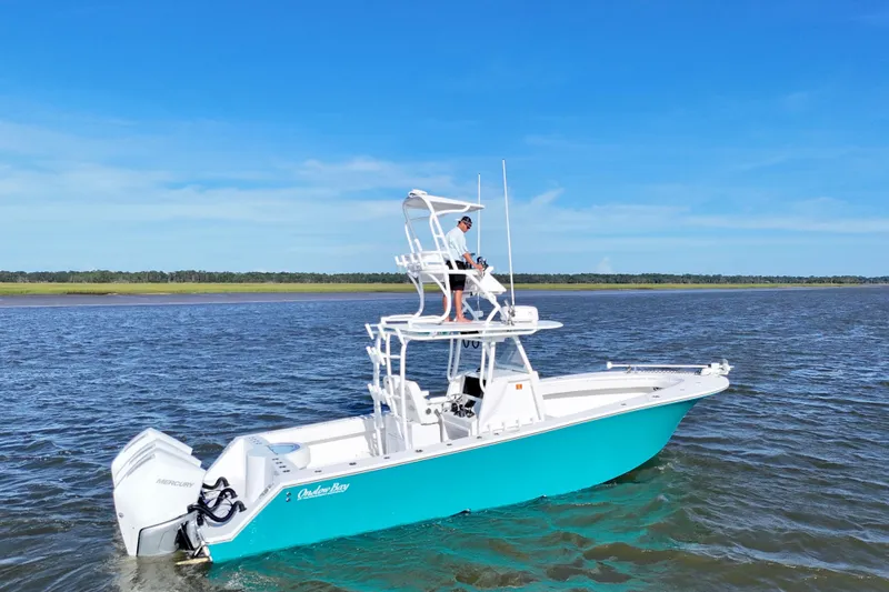  Yacht Photos Pics 2021 Onslow Bay 33 Tournament boat on water, featuring dual Mercury engines.