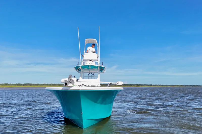  Yacht Photos Pics 2021 Onslow Bay 33 Tournament boat on open water under clear blue sky.