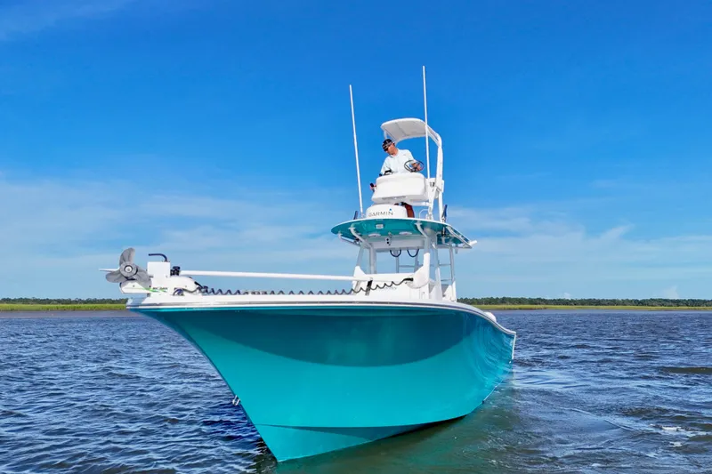  Yacht Photos Pics 2021 Onslow Bay 33 Tournament boat on water under clear blue sky.