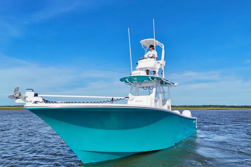  Yacht Photos Pics 2021 Onslow Bay 33 Tournament boat on water under clear blue sky.