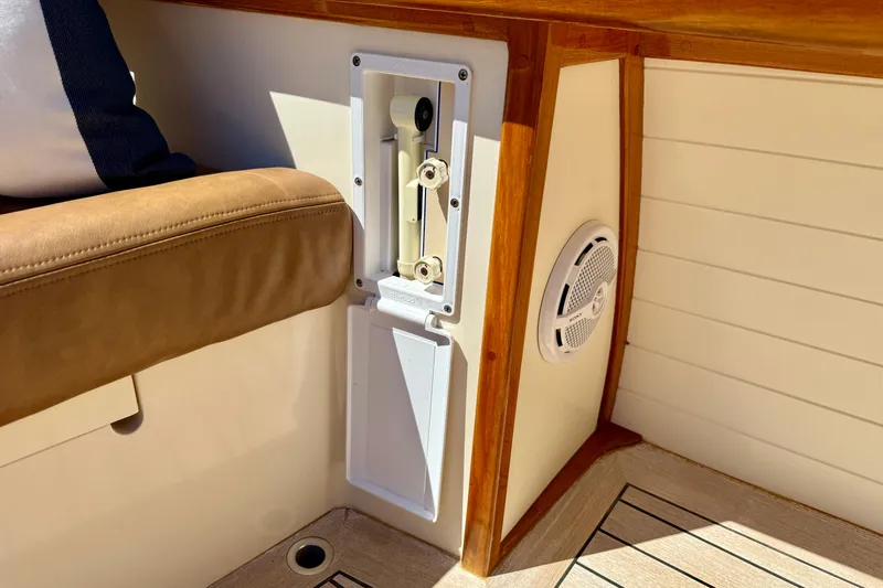 Picnic Yacht Photos Pics Interior detail of 2002 Palm Beach Motor Yachts Avalon 38, featuring seating and speaker.