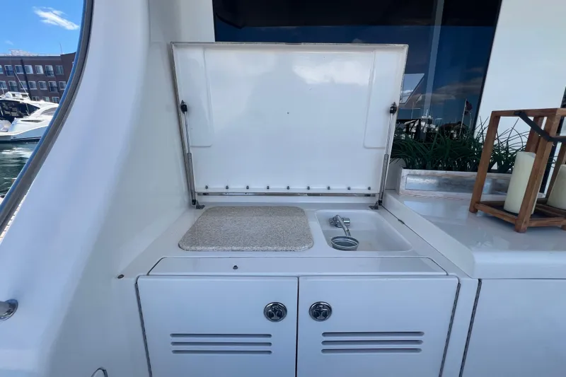  Yacht Photos Pics Outdoor sink and counter on 2004 Silverton 48 Convertible yacht.