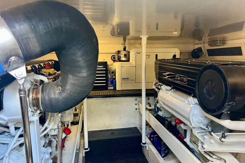  Yacht Photos Pics Engine room of a 2004 Silverton 48 Convertible yacht, featuring Kohler power systems.