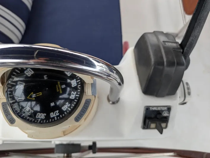 Seastar Yacht Photos Pics Compass and thruster controls on a 2003 Beneteau Oceanis 473 sailboat.