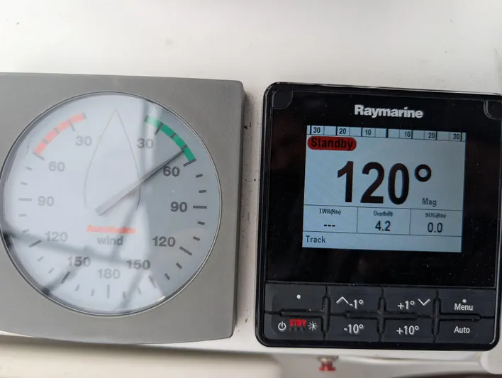 Seastar Yacht Photos Pics Beneteau Oceanis 473 2003 yacht instruments showing wind speed and Raymarine navigation display.