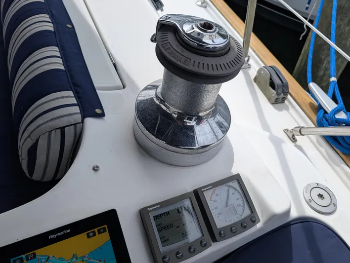 Seastar Yacht Photos Pics Control panel and winch on a 2003 Beneteau Oceanis 473 sailboat deck.