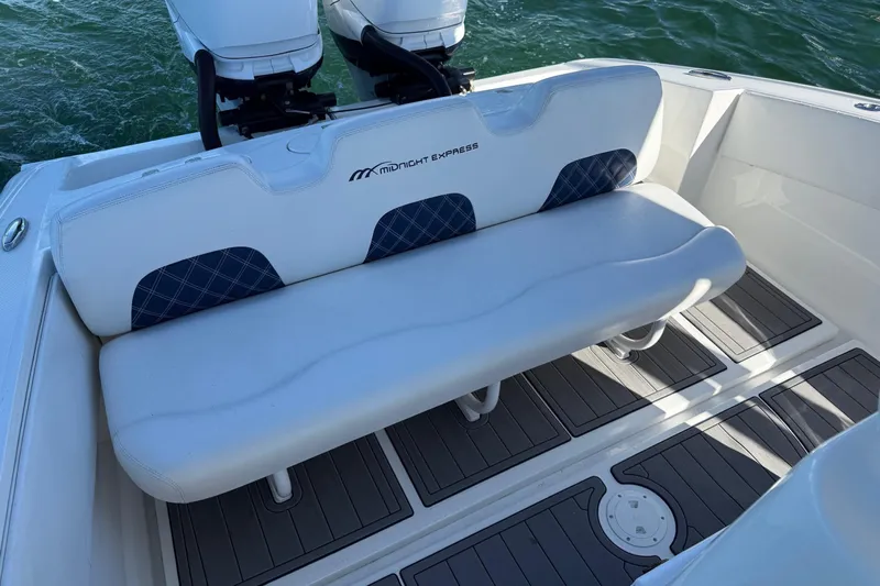  Yacht Photos Pics 2020 Midnight Express 34 Open boat seating with dual engines on water.