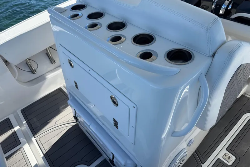  Yacht Photos Pics 2020 Midnight Express 34 Open boat interior with cup holders and seating.