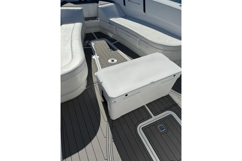  Yacht Photos Pics 2020 Midnight Express 34 Open boat interior with cushioned seating and deck.