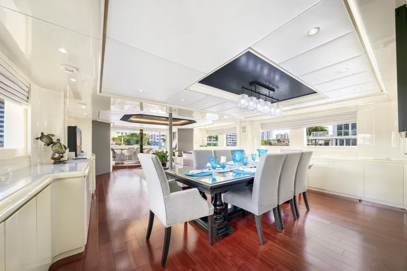 The Pearl Yacht Photos Pics Luxurious dining area on 1998 Intermarine 118 yacht with elegant decor and modern furnishings.