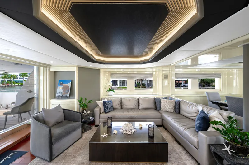 The Pearl Yacht Photos Pics Luxurious 1998 Intermarine 118 yacht interior with modern decor and spacious seating area.