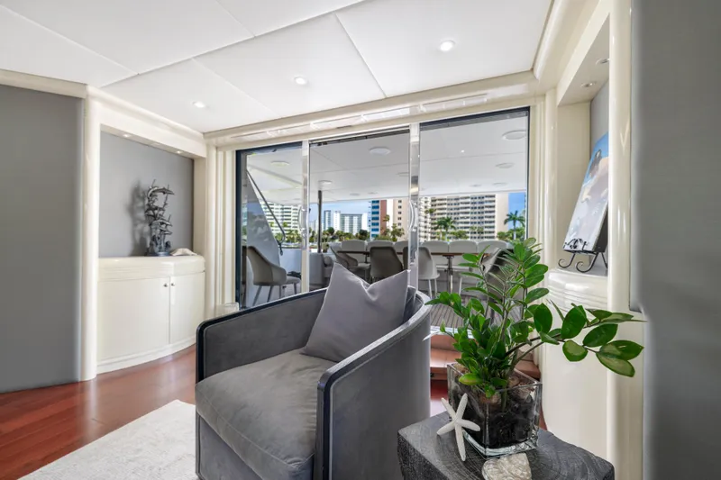 The Pearl Yacht Photos Pics Luxurious 1998 Intermarine 118 yacht interior with modern decor and large windows.