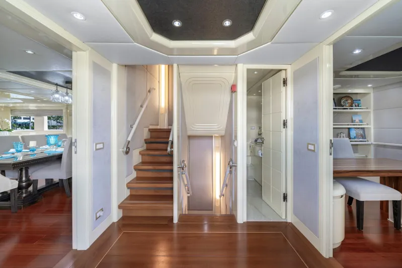 The Pearl Yacht Photos Pics Luxurious 1998 Intermarine 118 yacht interior with elegant wood flooring and modern design.