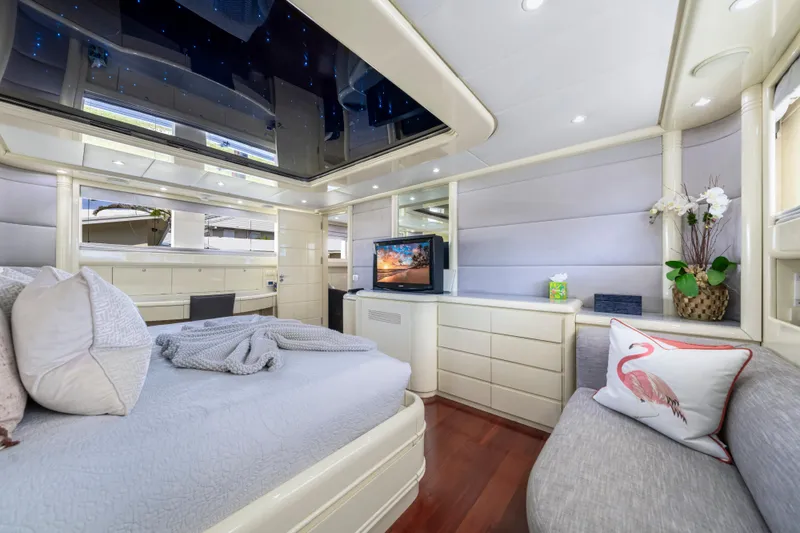 The Pearl Yacht Photos Pics Luxurious 1998 Intermarine 118 yacht bedroom with modern decor and elegant furnishings.