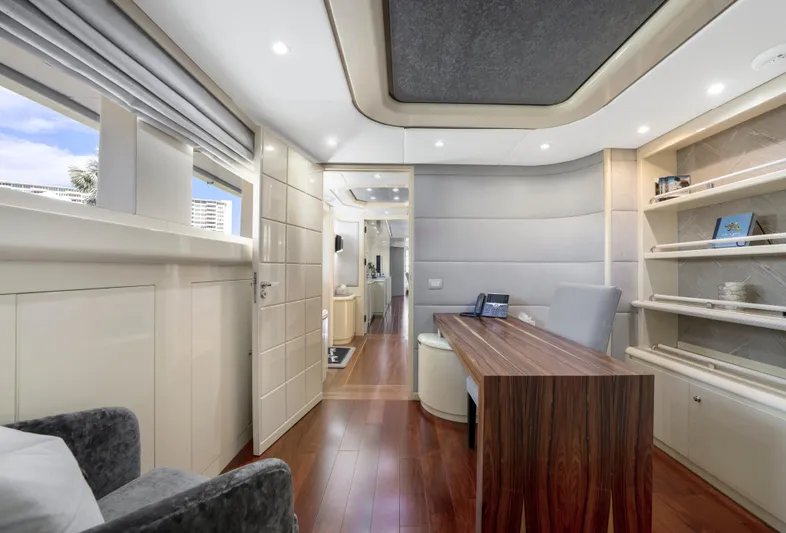 The Pearl Yacht Photos Pics Luxurious interior of 1998 Intermarine 118 yacht with modern furnishings and wood accents.