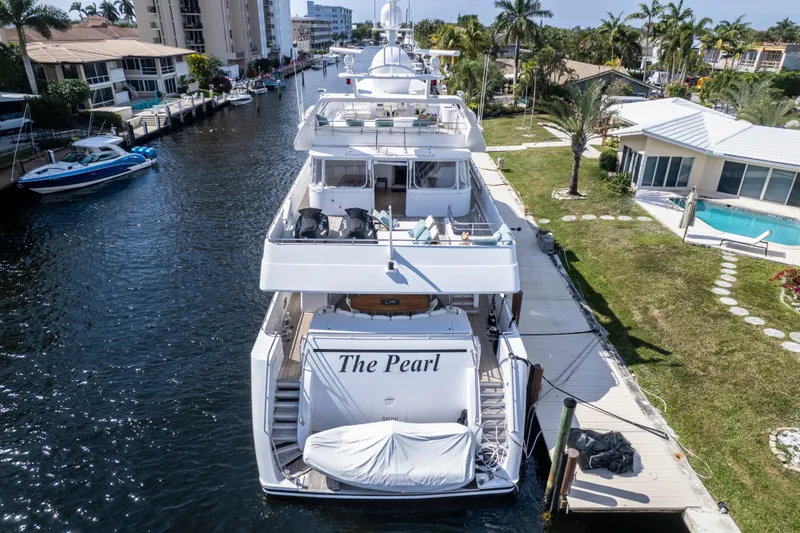 The Pearl Yacht Photos Pics Luxury yacht "The Pearl" docked in a scenic canal, Intermarine 118, 1998 model.