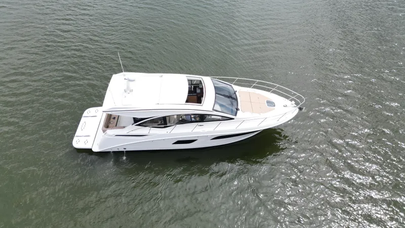 Finale Yacht Photos Pics 2017 Sea Ray Sundancer 400 yacht on open water, aerial view.