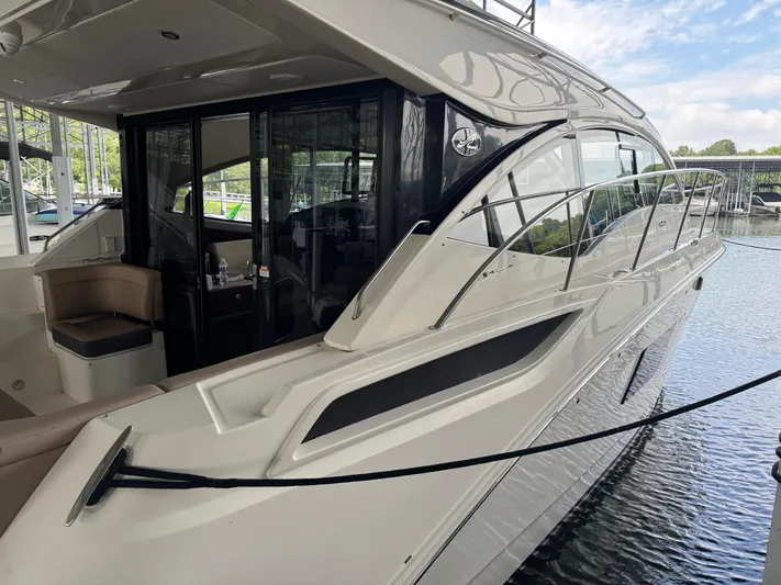 Finale Yacht Photos Pics 2017 Sea Ray Sundancer 400 yacht docked, showcasing sleek design and luxurious interior.