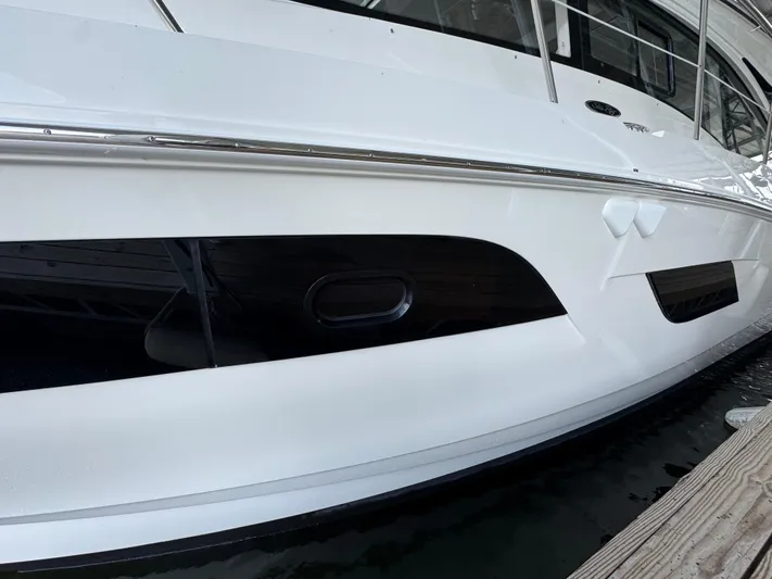 Finale Yacht Photos Pics 2017 Sea Ray Sundancer 400 yacht docked, showcasing sleek white hull design.