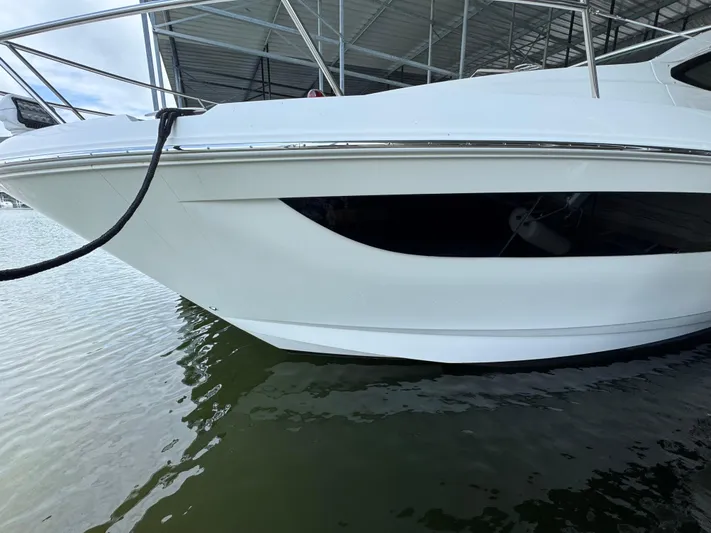 Finale Yacht Photos Pics 2017 Sea Ray Sundancer 400 yacht docked in marina, side view.