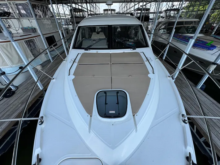 Finale Yacht Photos Pics 2017 Sea Ray Sundancer 400 yacht docked, featuring spacious deck and sleek design.