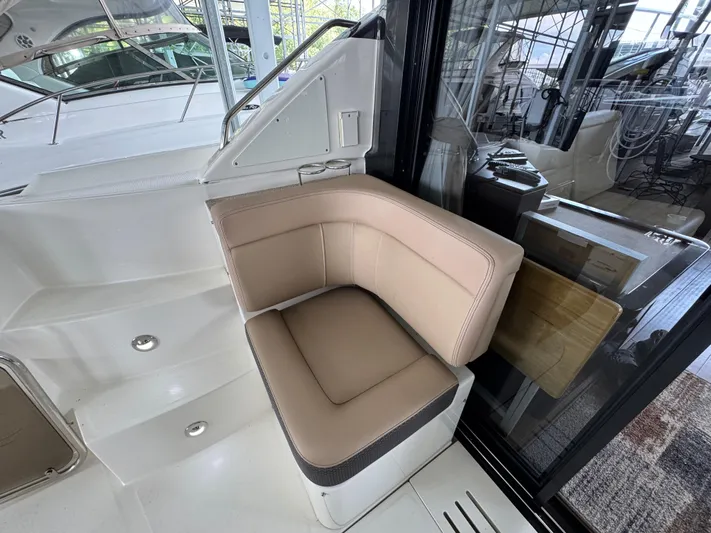 Finale Yacht Photos Pics 2017 Sea Ray Sundancer 400 interior with beige seating and modern design.