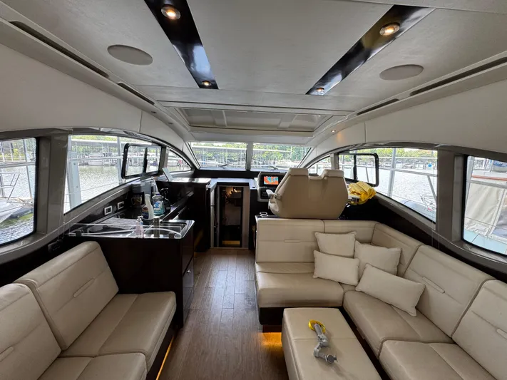 Finale Yacht Photos Pics Luxurious interior of 2017 Sea Ray Sundancer 400 yacht with plush seating and modern amenities.